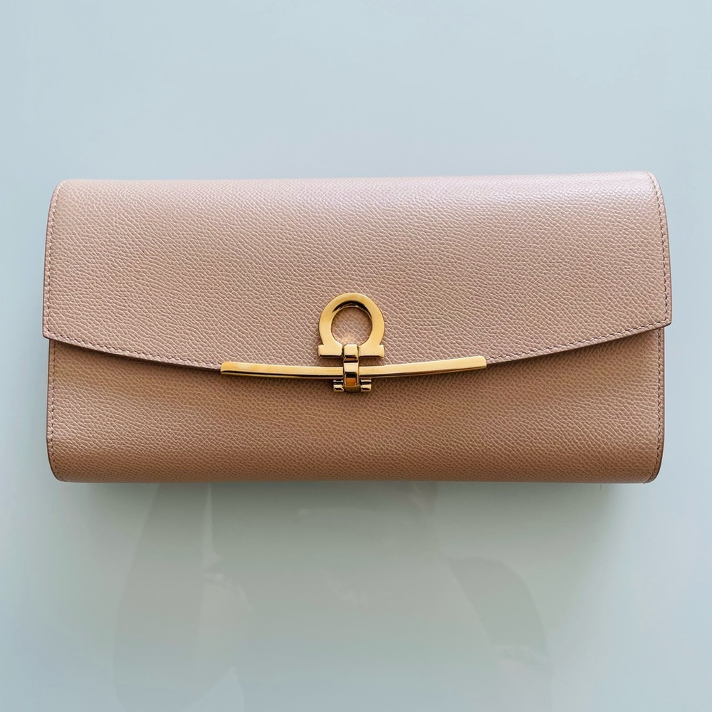 Salvatore Ferragamo authentic leather clutch and optional chain